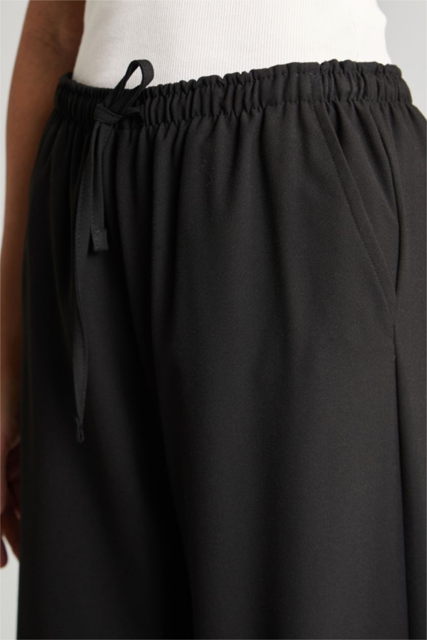 Women Black Normal Waist Wide Leg Trousers