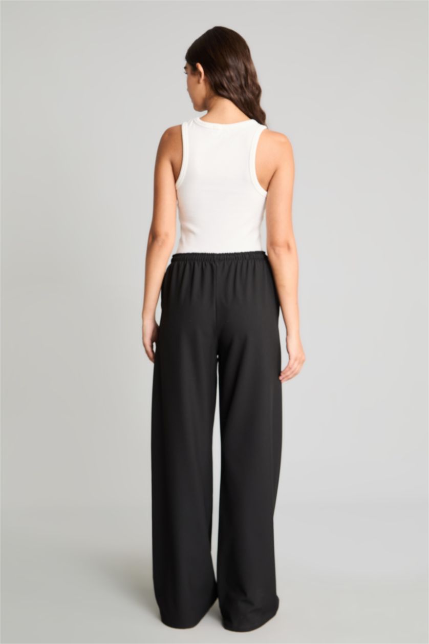 Women Black Normal Waist Wide Leg Trousers