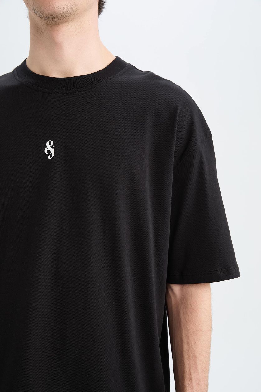 Erkek Siyah %100 Pamuk Oversize Geniş Kalıp Bisiklet Yaka Baskılı Kısa Kollu Tişört