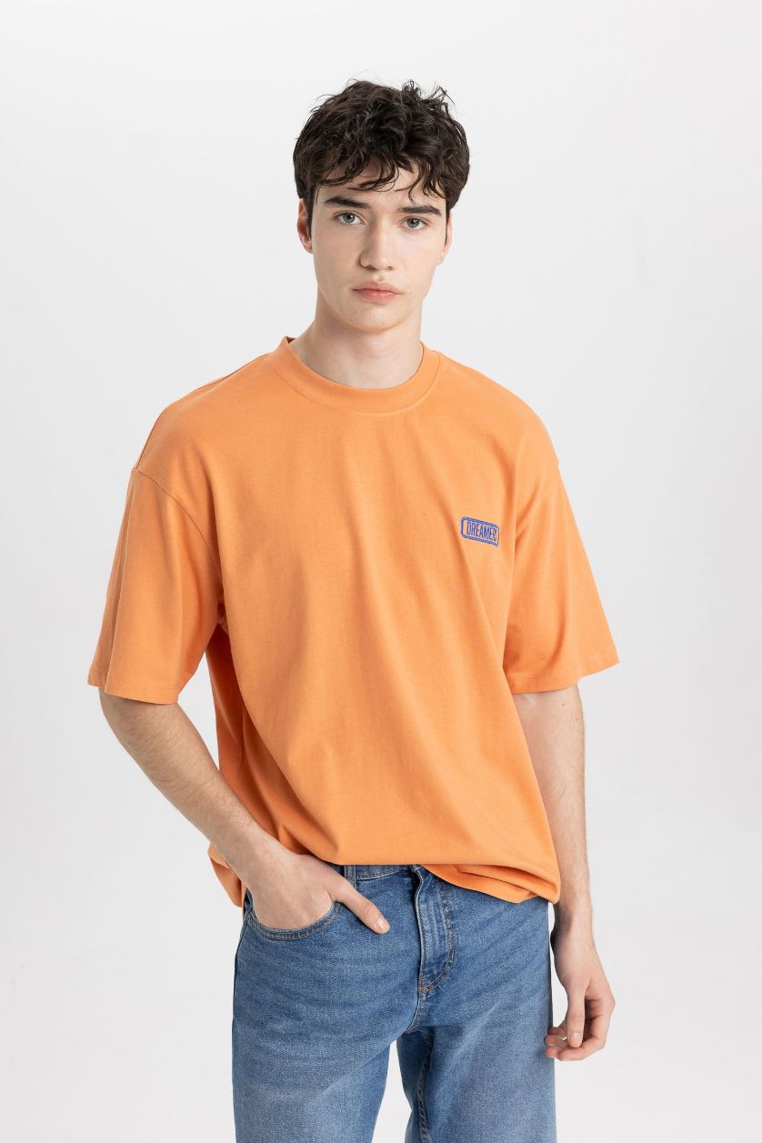 رجال برتقالي تي شيرت نص كم قصة مريحة بياقة مستديرة
