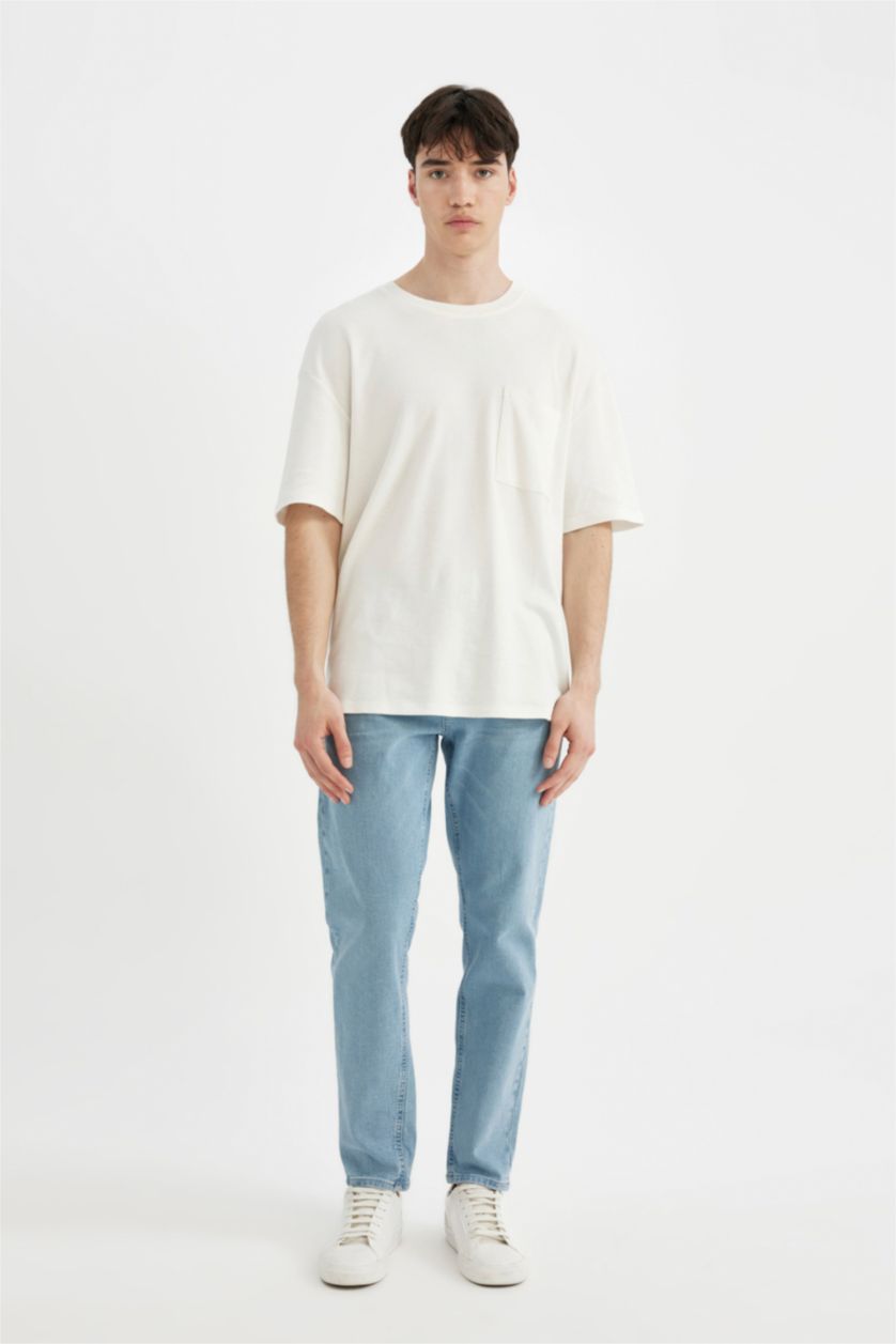 MAN Light Blue Slim Tapered Fit Trousers