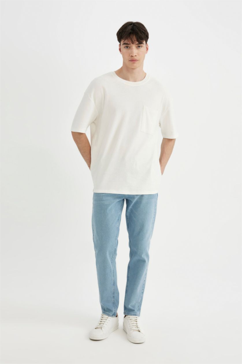 MAN Light Blue Slim Tapered Fit Trousers