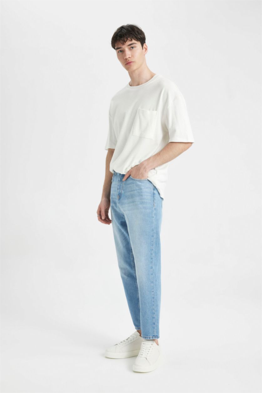 رجالي أزرق فاتح بنطلون جينز قصة فضفاضة ممزق