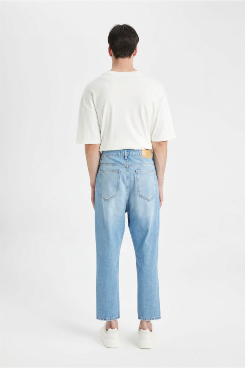 رجالي أزرق فاتح بنطلون جينز قصة فضفاضة ممزق