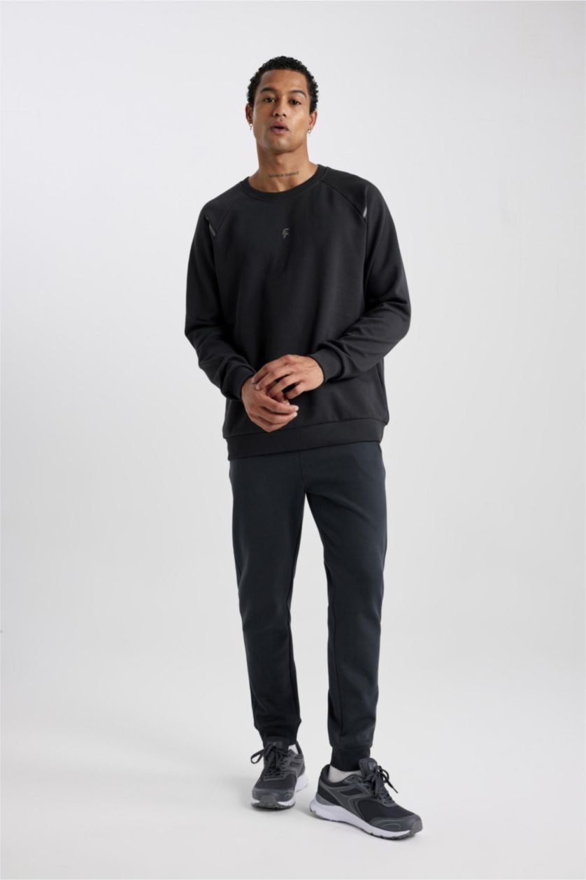 رجال أنثرا سويت شيرت قصة عادية من قماش سكوبا من DeFactoFit