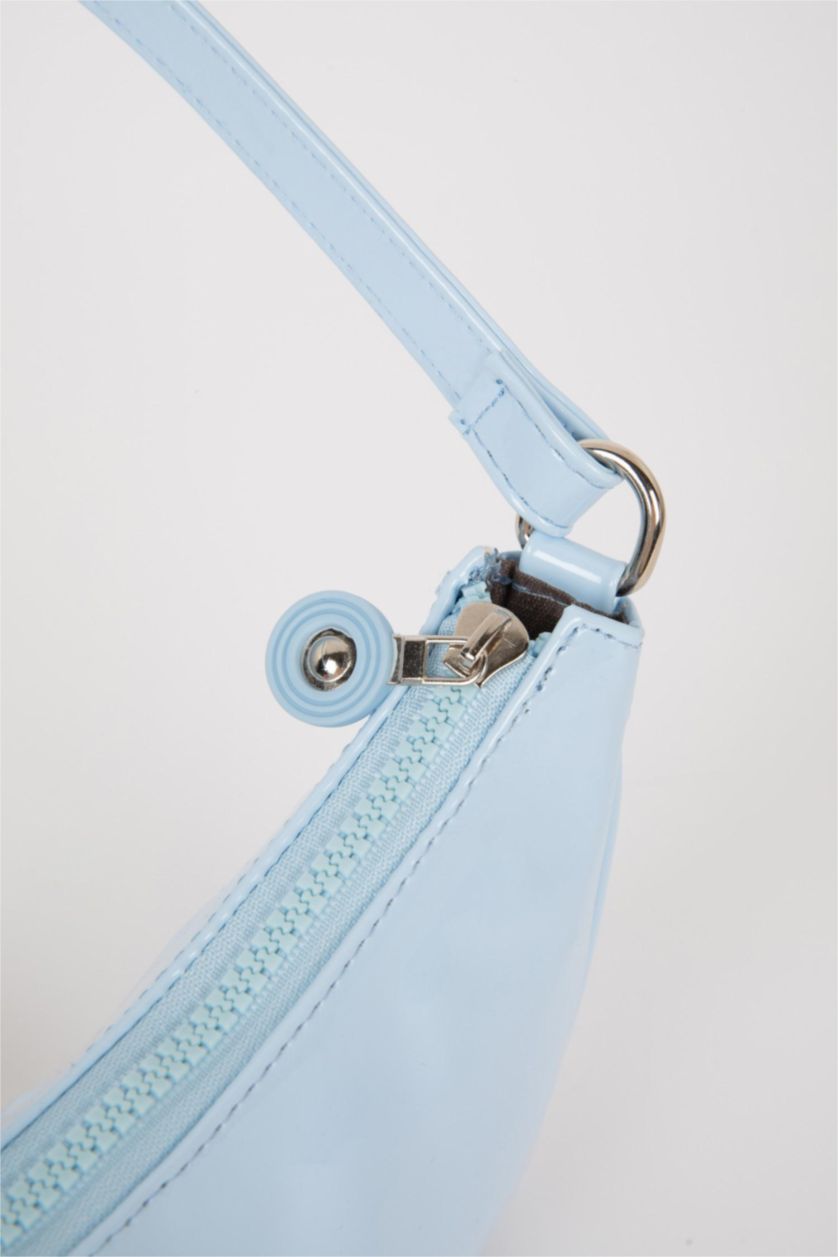 بناتي أزرق فاتح شنطة كروس بودي بناتي قماش لامع أزرق