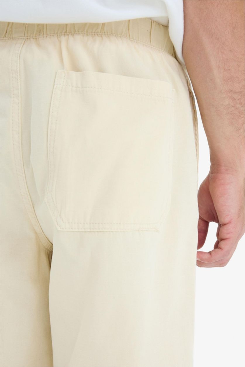 MAN Beige Wide Leg Trousers