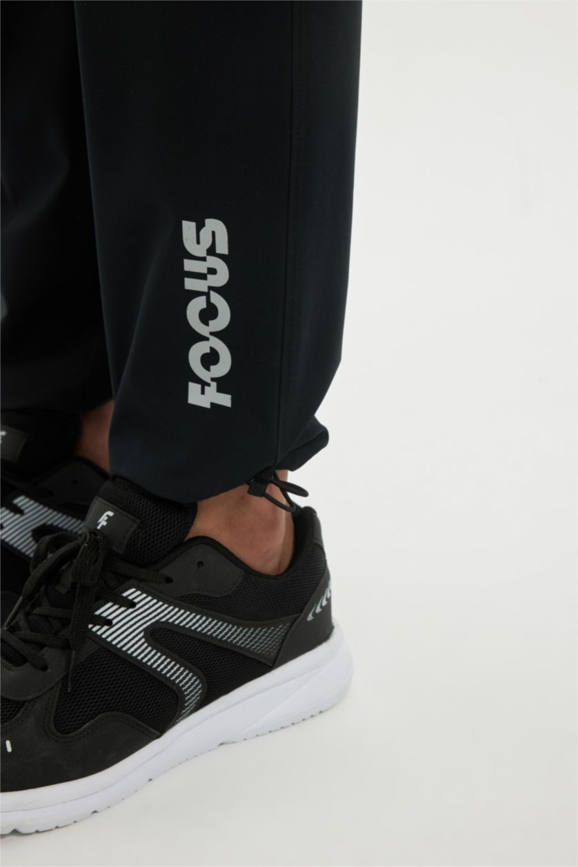 Men Black Slim Fit Woven Jogger