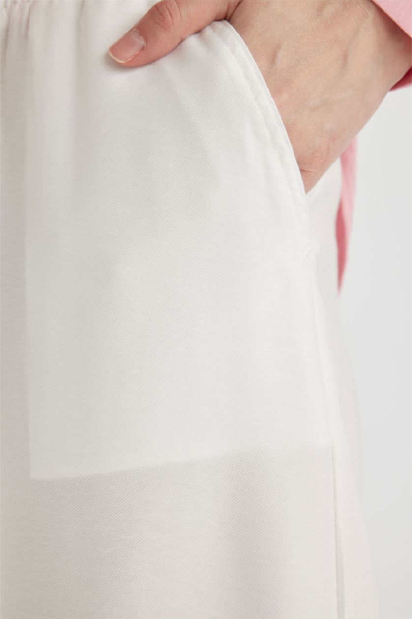 نساء بيج فاتح سروال قصة عادية