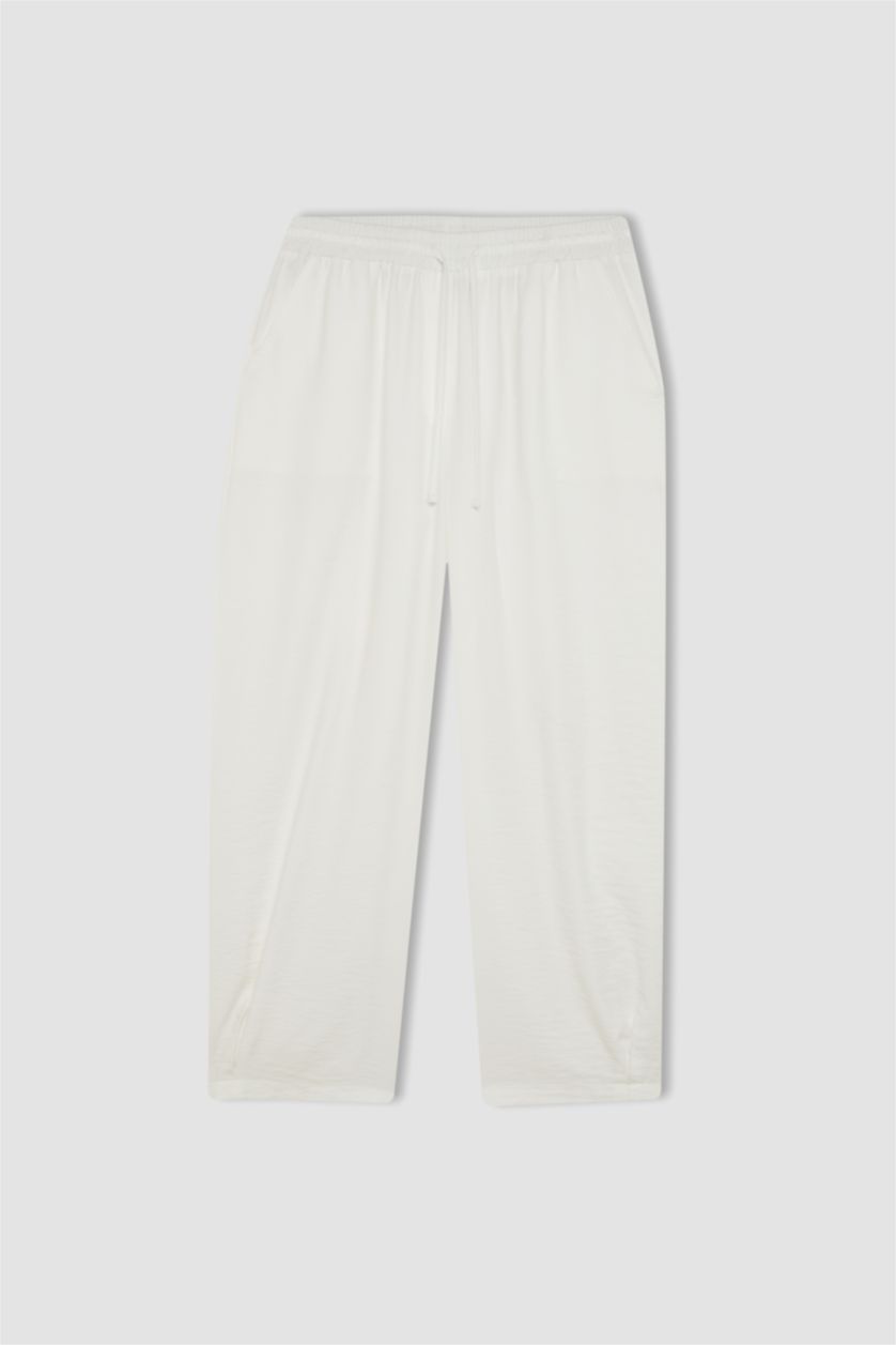 نساء بيج فاتح سروال قصة عادية