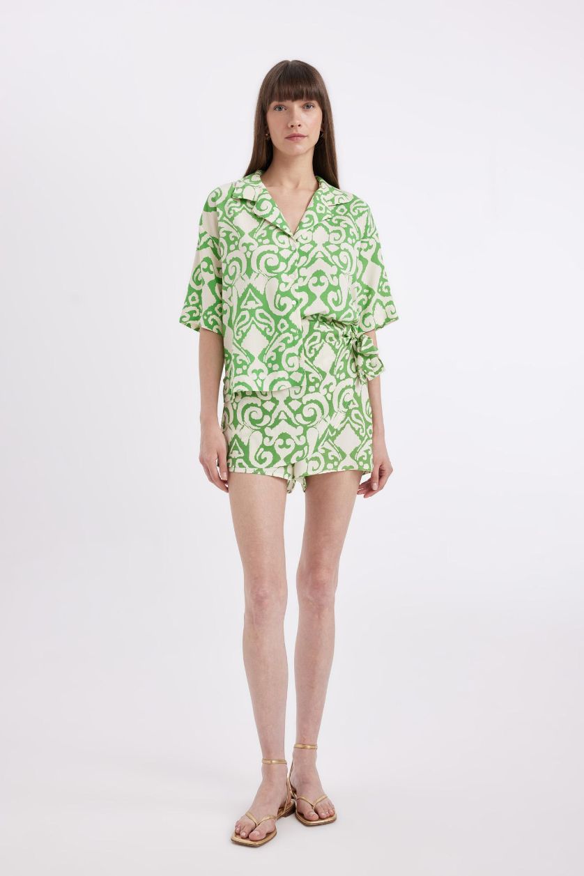 نساء أخضر قميص بولو نص كم قصة عادية