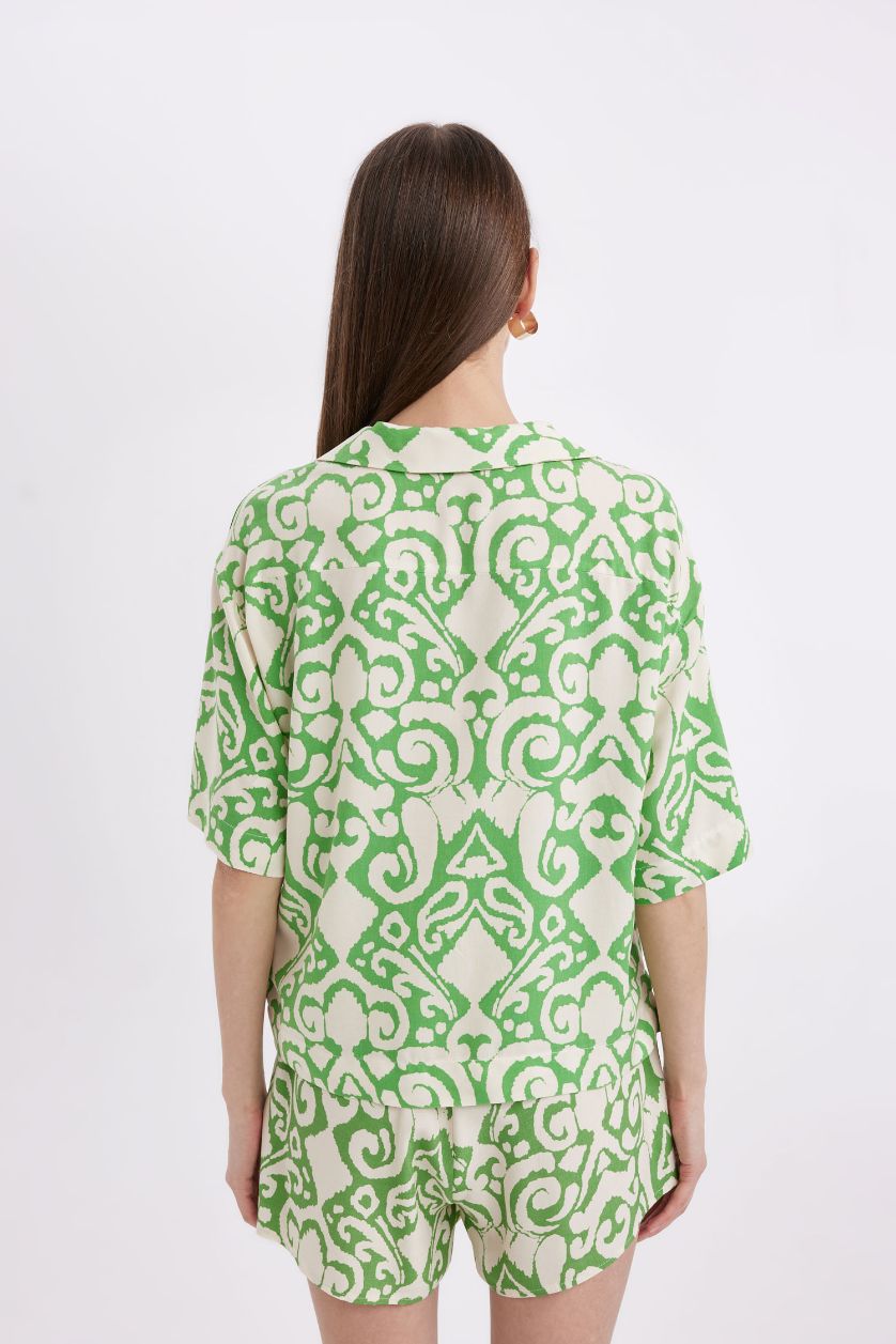 نساء أخضر قميص بولو نص كم قصة عادية