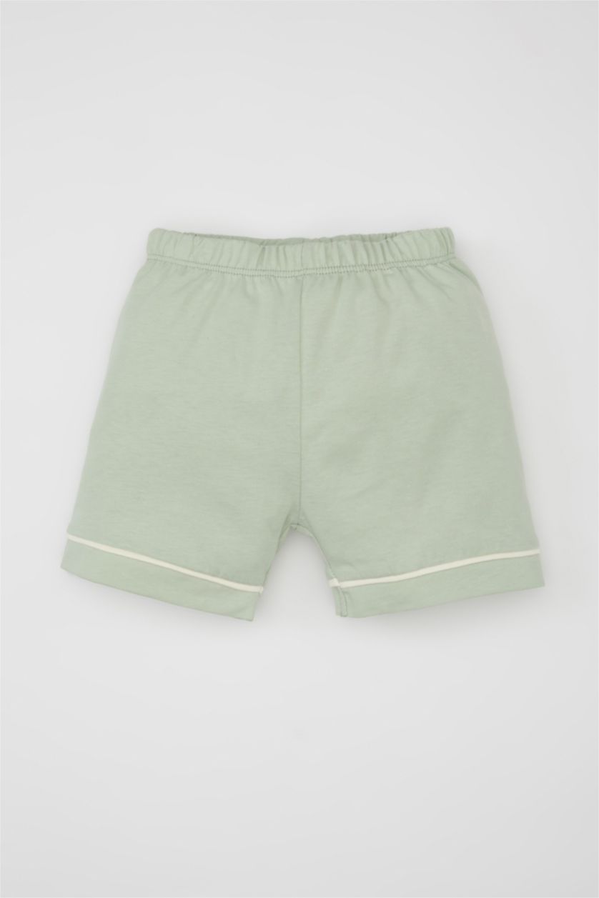 طفلة صغيرة بيج فاتح طقم بيجاما مطرز ممشط نص كم - قطعتين