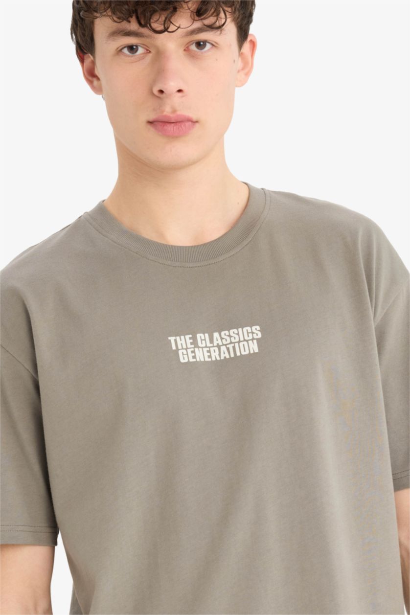 Erkek Haki %100 Pamuk Oversize Geniş Kalıp Bisiklet Yaka Sırt Baskılı Kısa Kollu Tişört