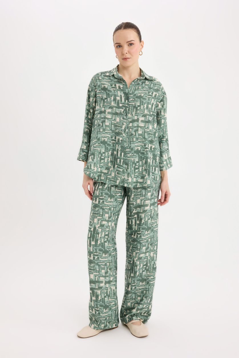 نساء أخضر فاتح قميص ردن طويل قصة عادية