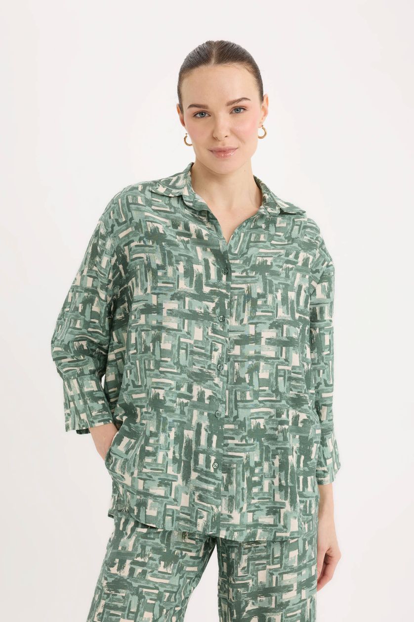 نساء أخضر فاتح قميص ردن طويل قصة عادية