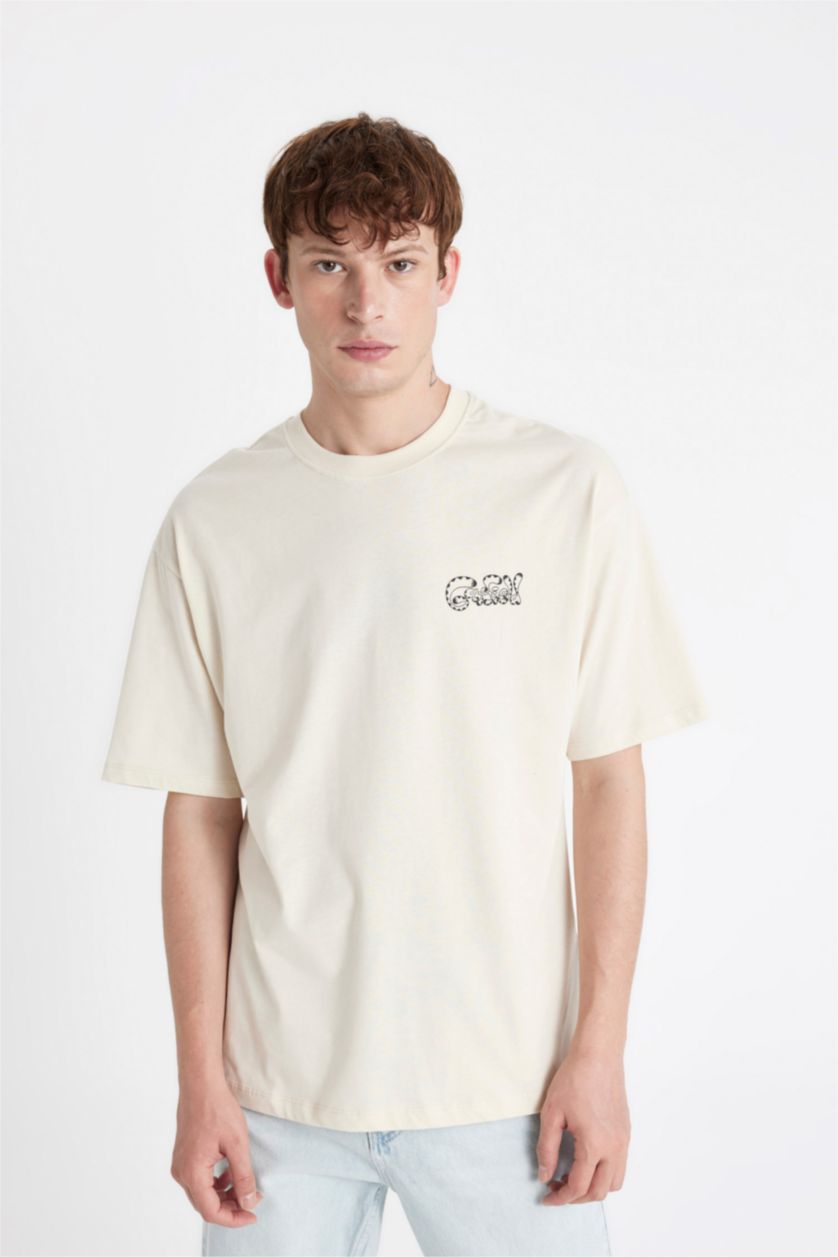 Erkek Kum %100 Pamuk Garfield Boxy Fit Bisiklet Yaka Sırt Baskılı Kısa Kollu Tişört