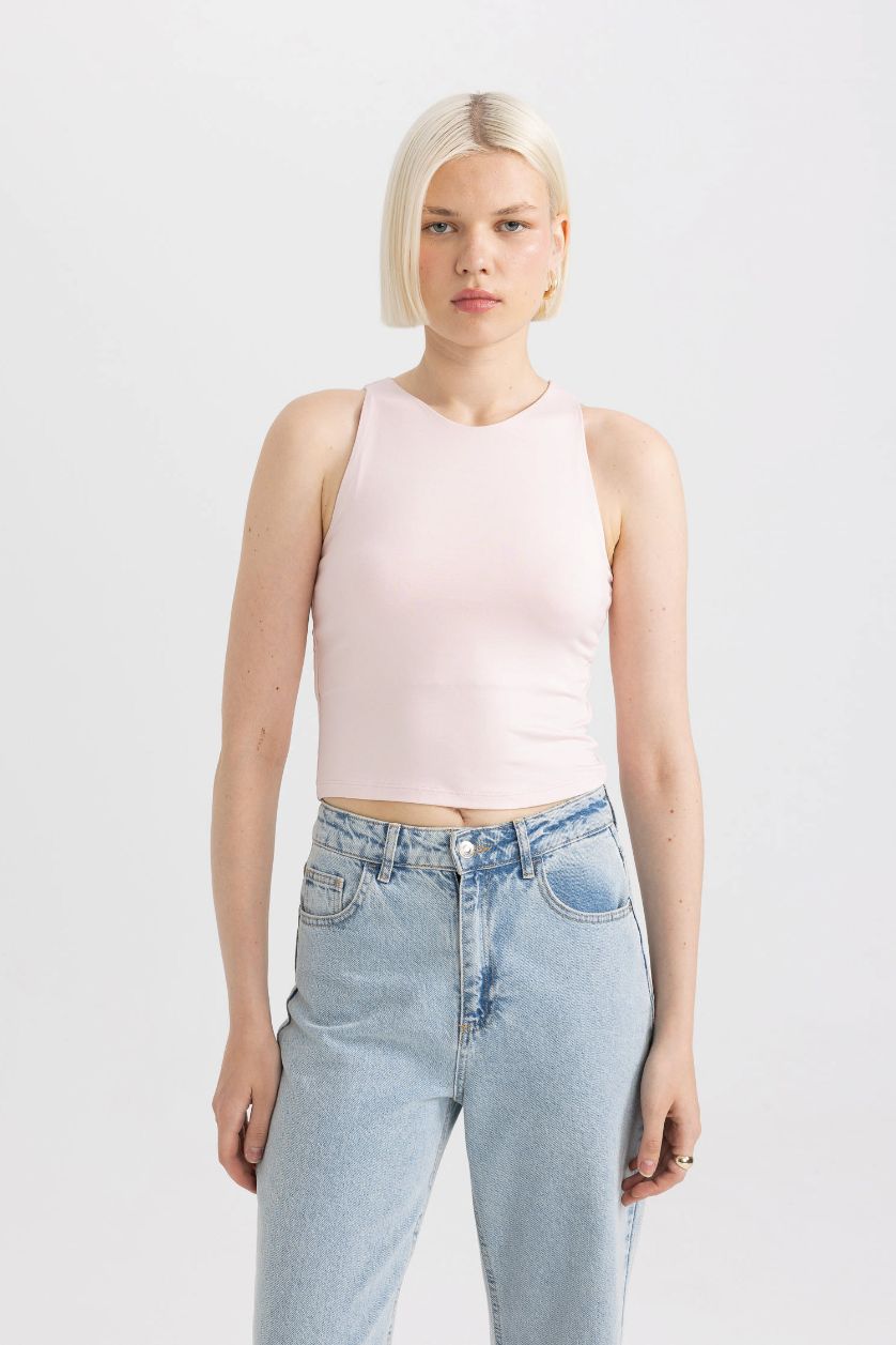 FEMME Rose Clair Débardeur à Coupe Slim et col Halter