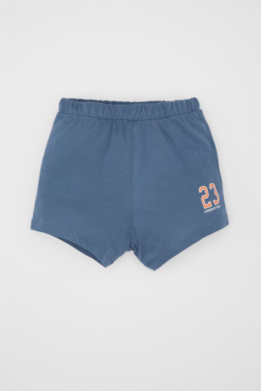 مولود ذكر نيلي فاتح طقم ولادي شورت وتيشيرت بطبعة شعار - قطعتين