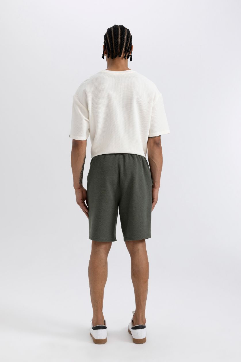 رجالي كاكي غامق شورت بيزك بيكيه سليم فيت