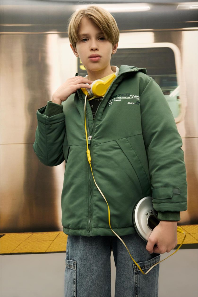 أولاد كاكي جاكيت مطر ولادي بغطاء للرأس