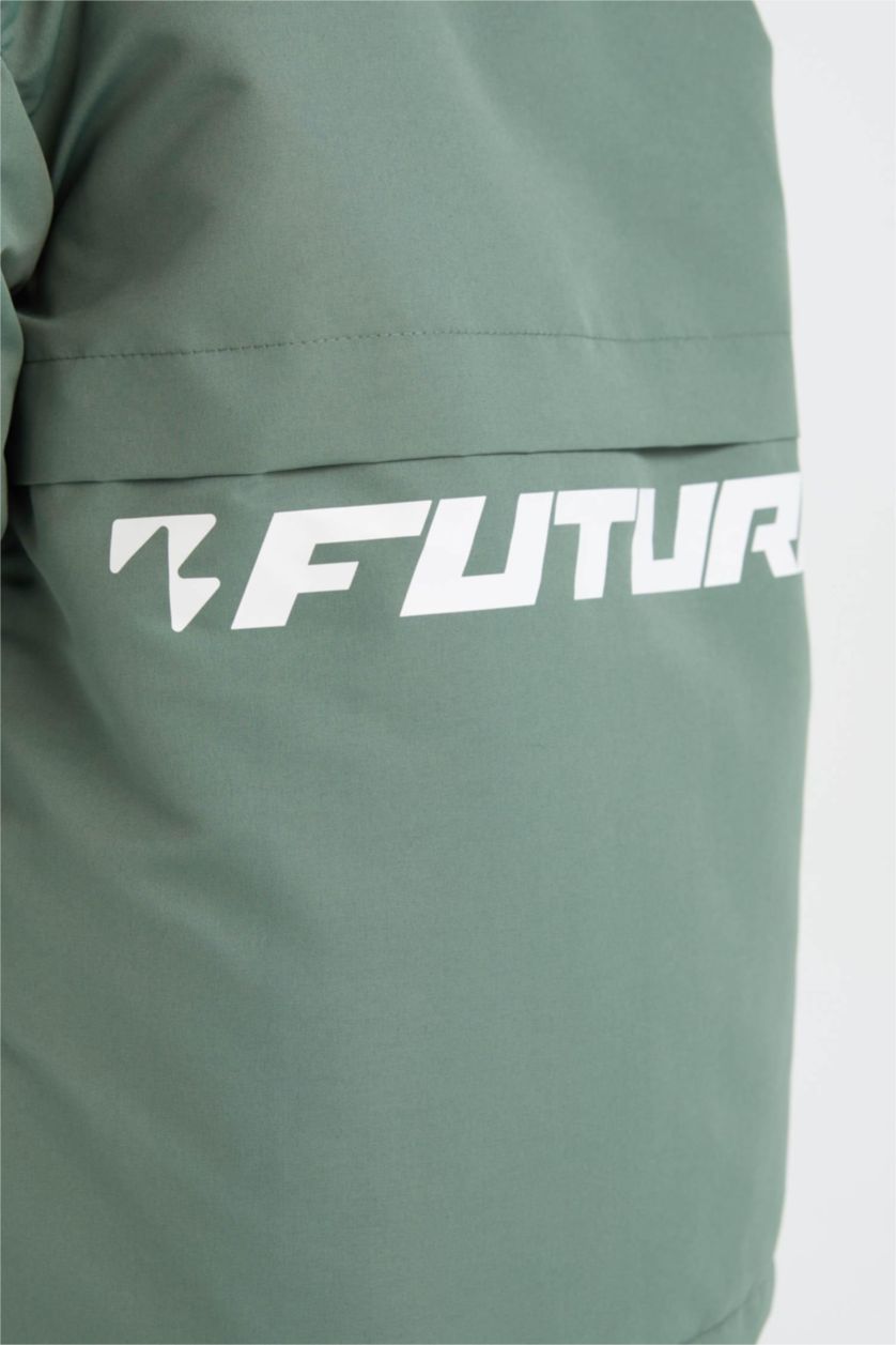 أولاد كاكي جاكيت مطر ولادي بغطاء للرأس