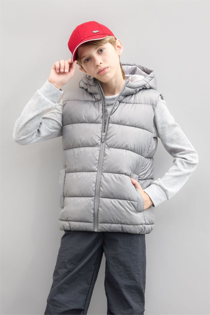 أولاد رمادي فاتح يلك نفخ اولادي بغطاء للرأس ومقاوم للماء