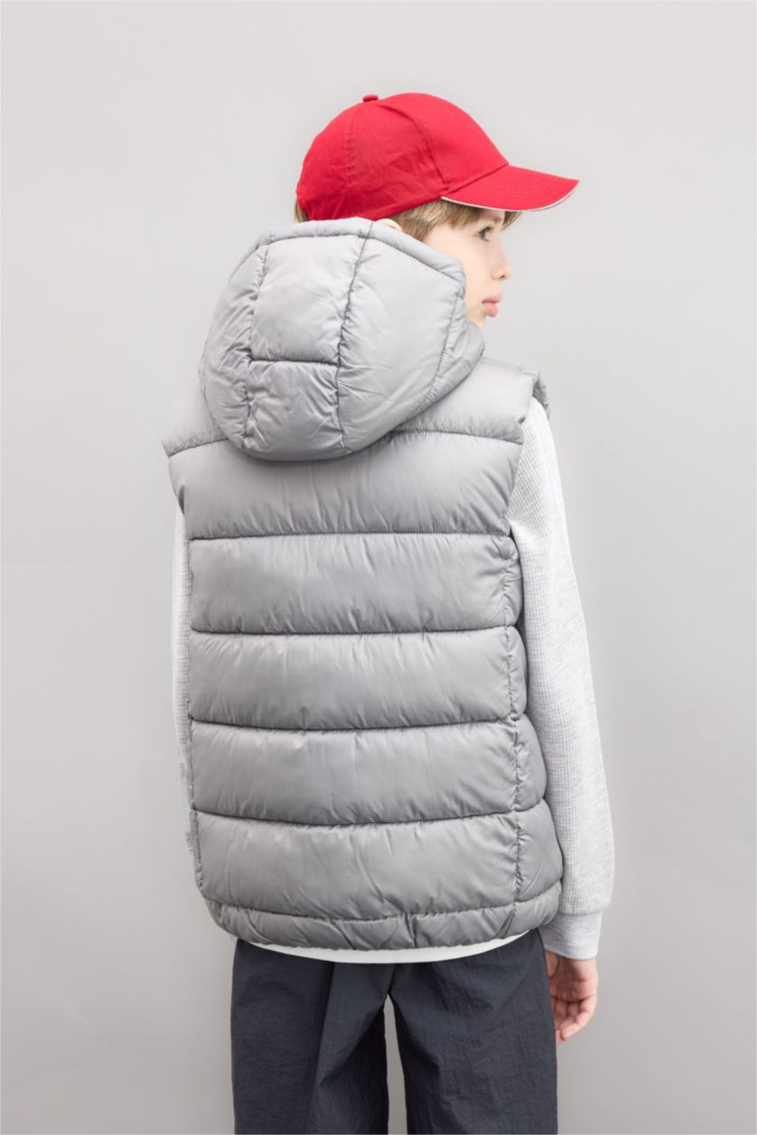 أولاد رمادي فاتح يلك نفخ اولادي بغطاء للرأس ومقاوم للماء