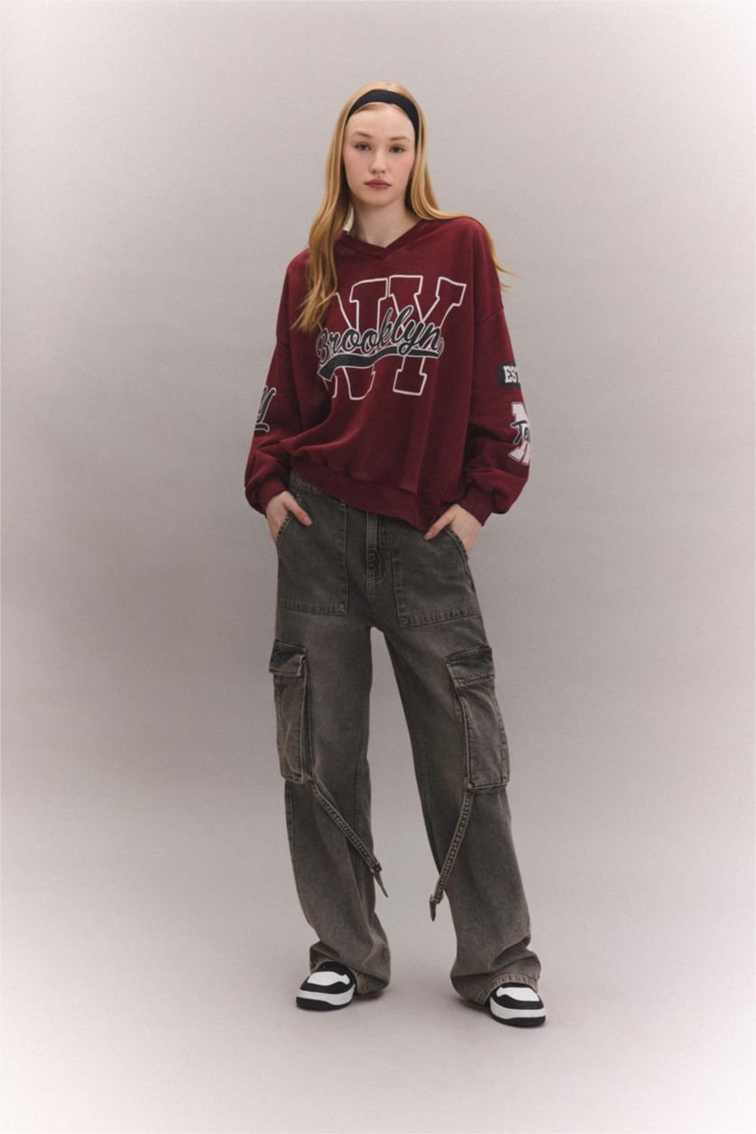 نساء خمري سويت شيرت واسع برقبة V وتأثير باهت