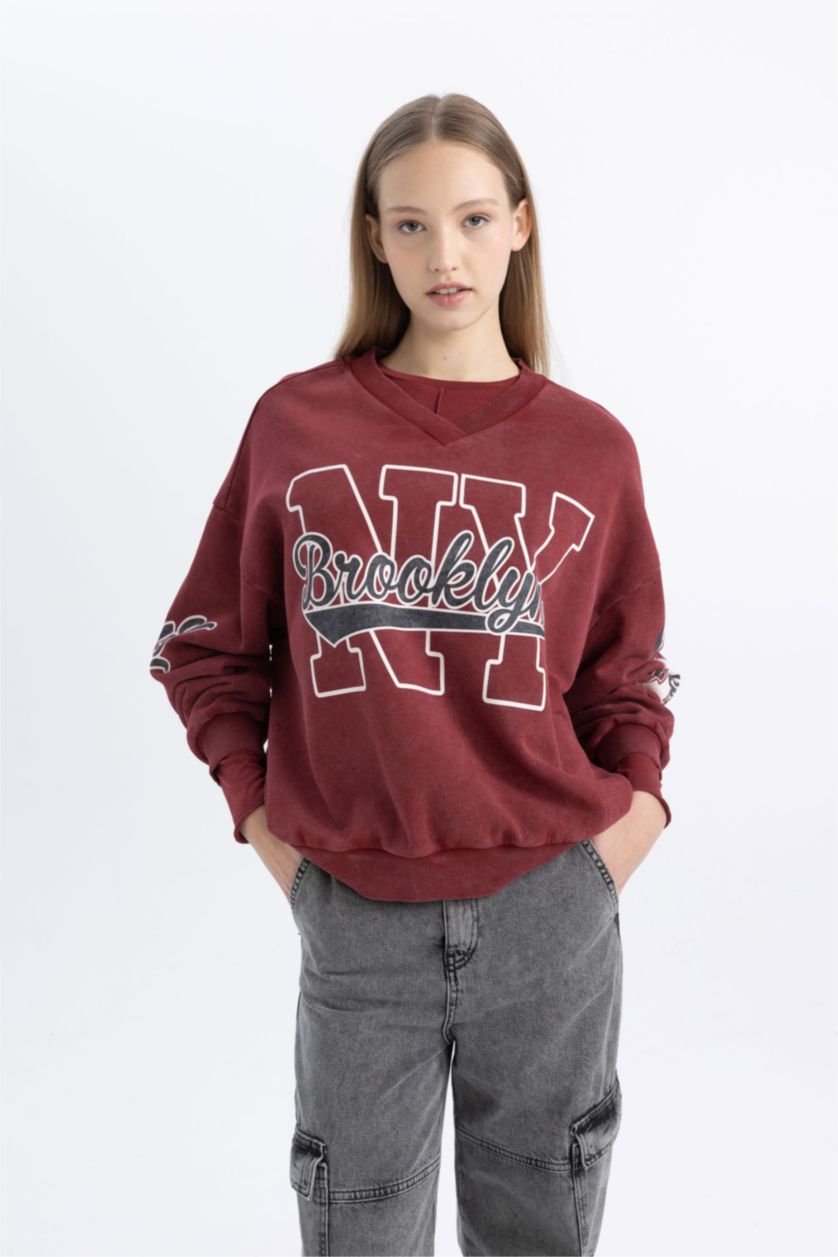 نساء خمري سويت شيرت واسع برقبة V وتأثير باهت