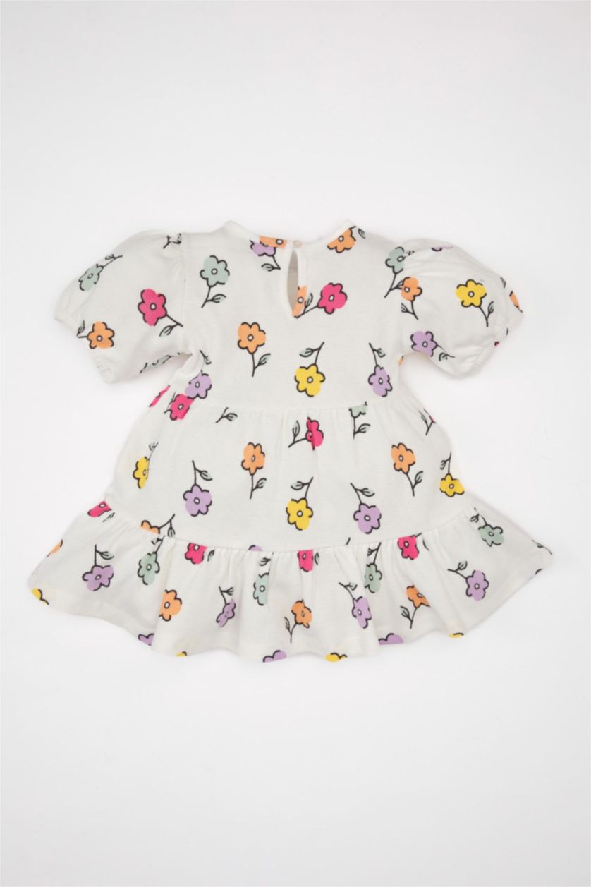 طفلة صغيرة بيج فاتح فستان فلورال بناتي وافل قصة عادية نص ردن بياخة مستديرة