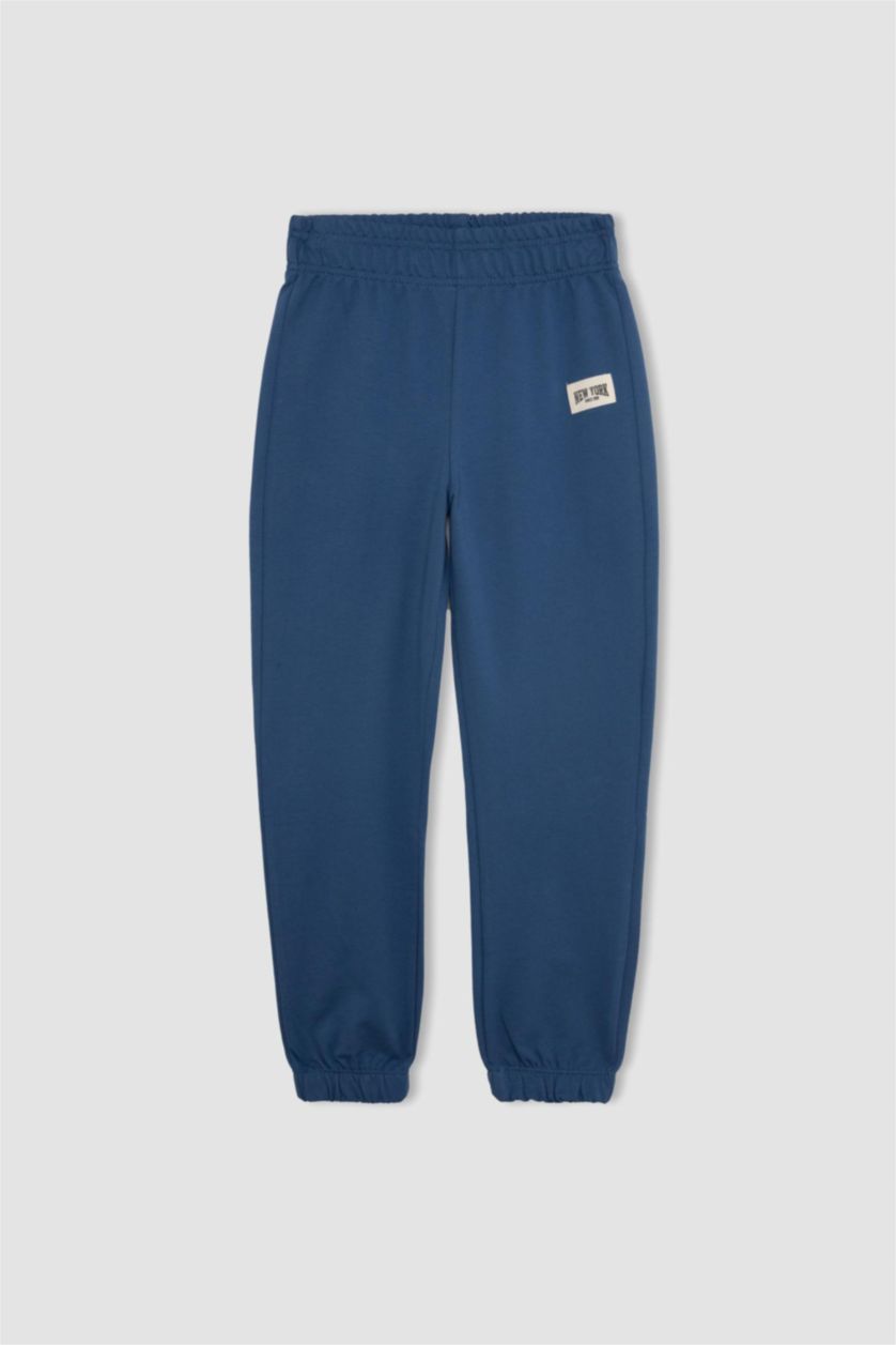 Kız Çocuk - Genç Kız İndigo Kız Çocuk Dokuma Etiketli Beli ve Paçası Lastikli Jogger Eşofman Altı