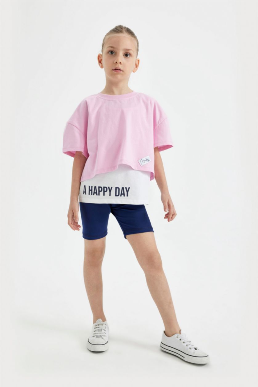 بنات زهري فاتح تيشيرت بناتي نص ردن أوفر سايز