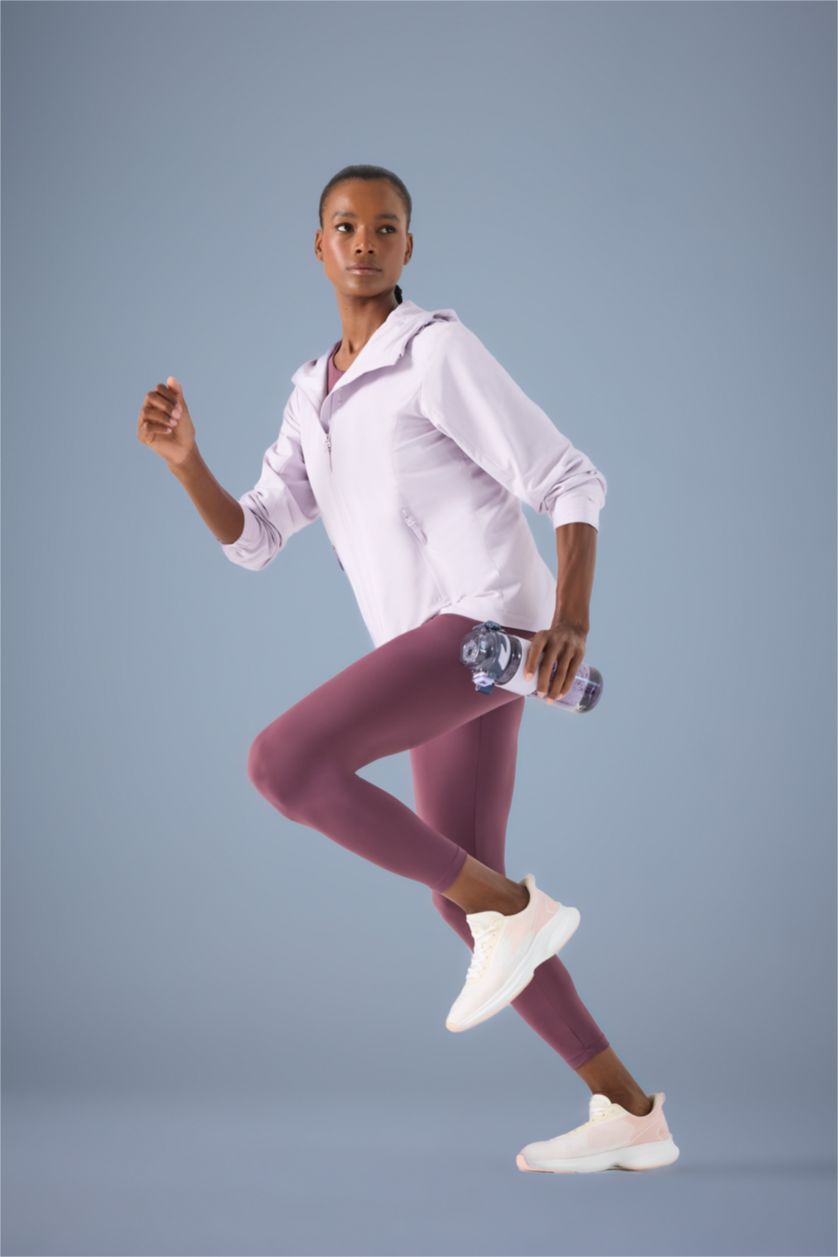 نساء أرجواني جاكيت مطر قصة عادية بغطاء للرأس مقاوم للماء من DeFactoFit