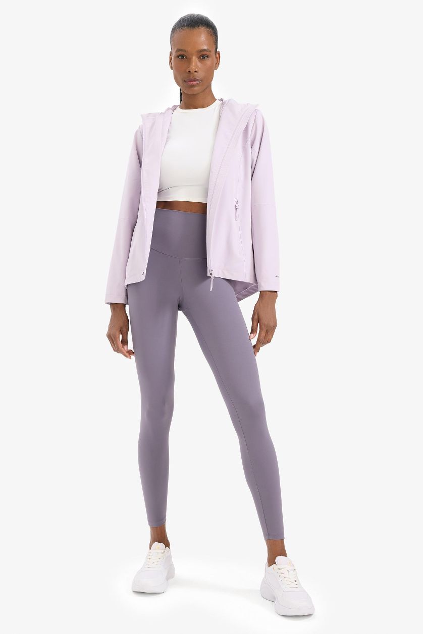 نساء أرجواني جاكيت مطر قصة عادية بغطاء للرأس مقاوم للماء من DeFactoFit