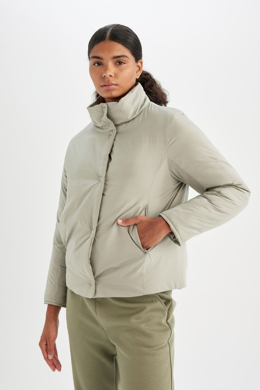 نساء كاكي فاتح جاكيت خفيف قصة عادية مقاوم للماء