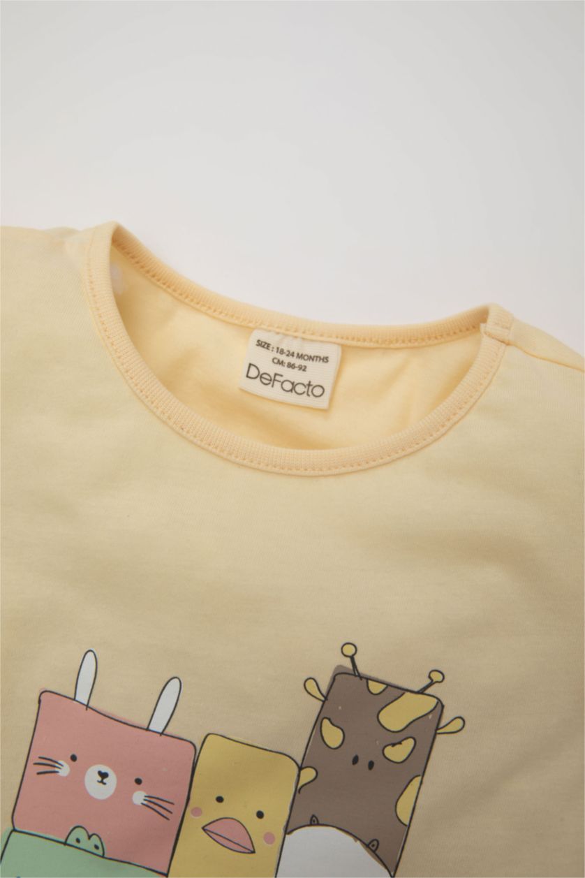 Kız Bebek Ekru Kız Bebek Pijama Takımı Bisiklet Yaka Baskılı Penye Kısa Kollu Üst Şort