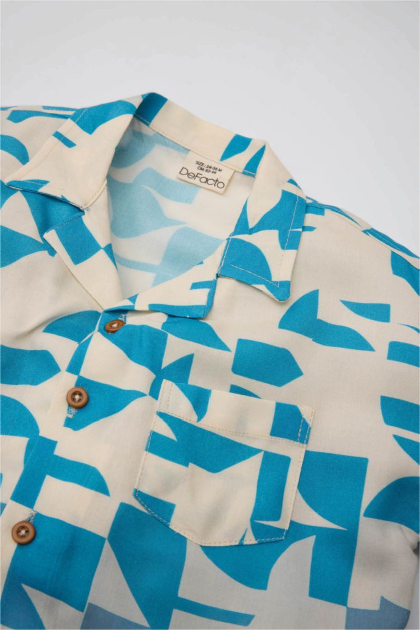 طفل صغير بيج فاتح قميص ولادي نص ردن قصة عادية بياخة عالية