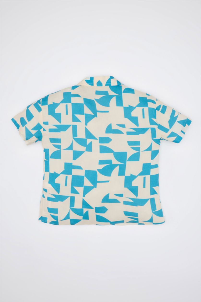 طفل صغير بيج فاتح قميص ولادي نص ردن قصة عادية بياخة عالية