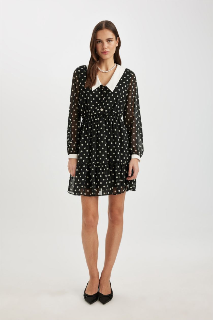 FEMME Noir Mini robe à manches longues en mousseline à pois