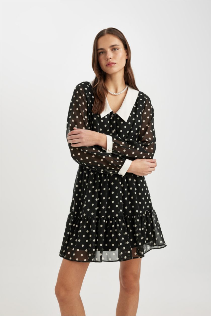 FEMME Noir Mini robe à manches longues en mousseline à pois