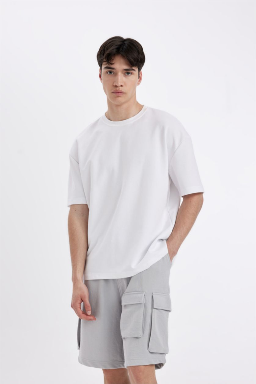 رجال رمادي فاتح شورت كارجو قصة مريحة بجيب