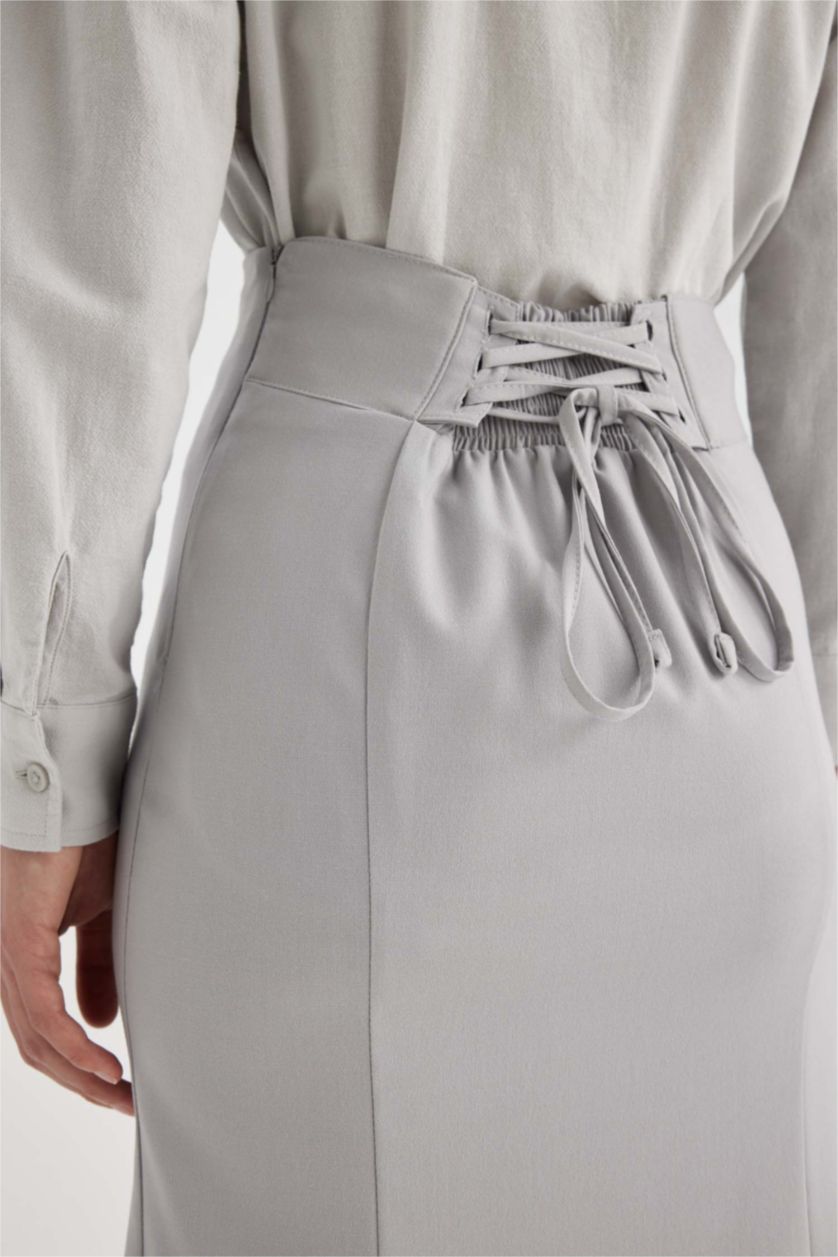 حريمي رمادي جيبة طويلة بنسل