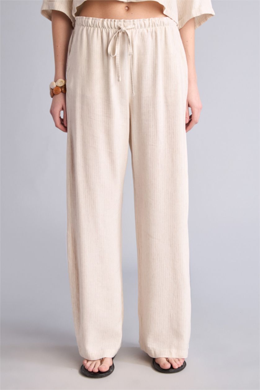 حريمي بيج بنطلون كتان مخطط وايد ليج بجيب مزدوج