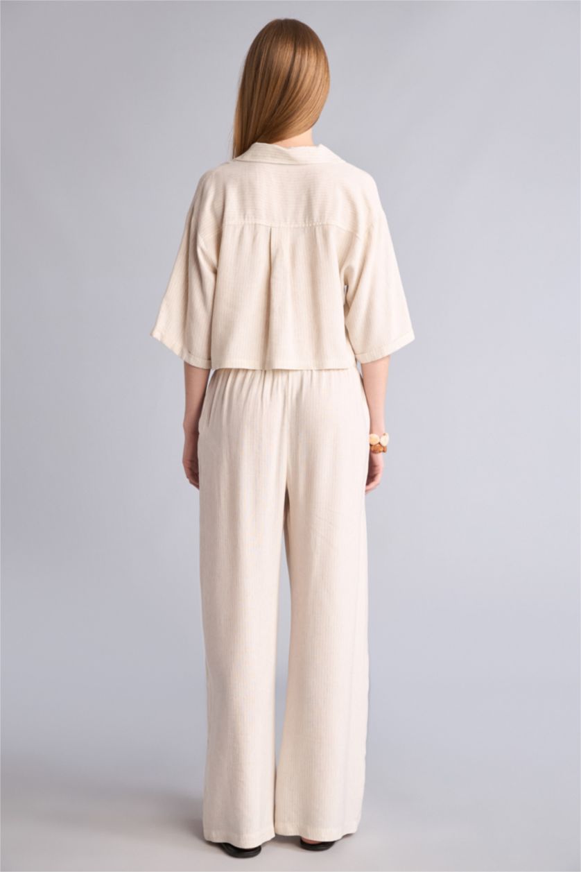 حريمي بيج بنطلون كتان مخطط وايد ليج بجيب مزدوج