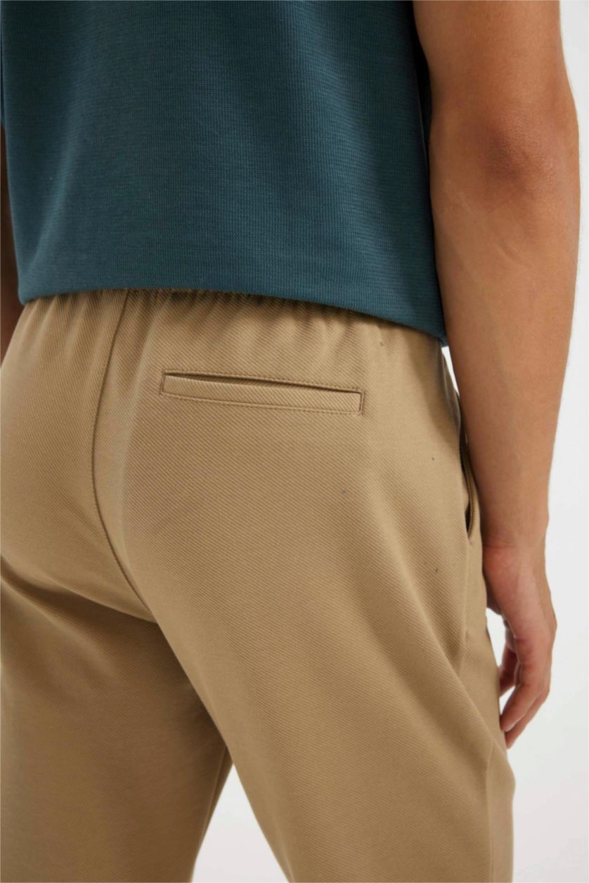 رجال بيج غامق بنطرون جوجر فيت برجل ضيق