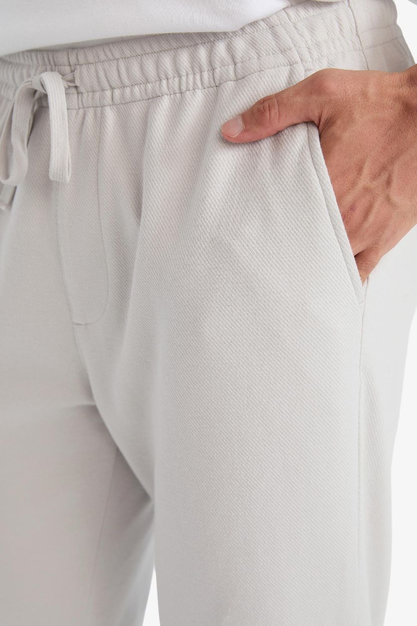 MAN Stone Straight Leg Trousers