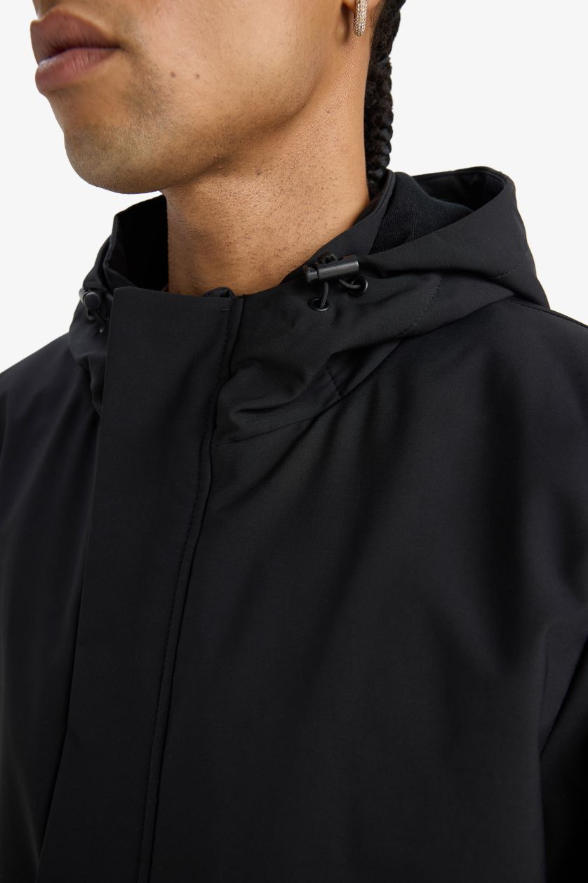 Мужчины Черный Водоотталкивающий дождевик DeFactoFit Regular Fit с капюшоном и молнией