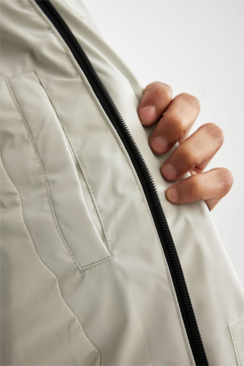 رجال نعناع جاكيت ضد الماء قصة عادية بغطاء للرأس من DeFactoFit