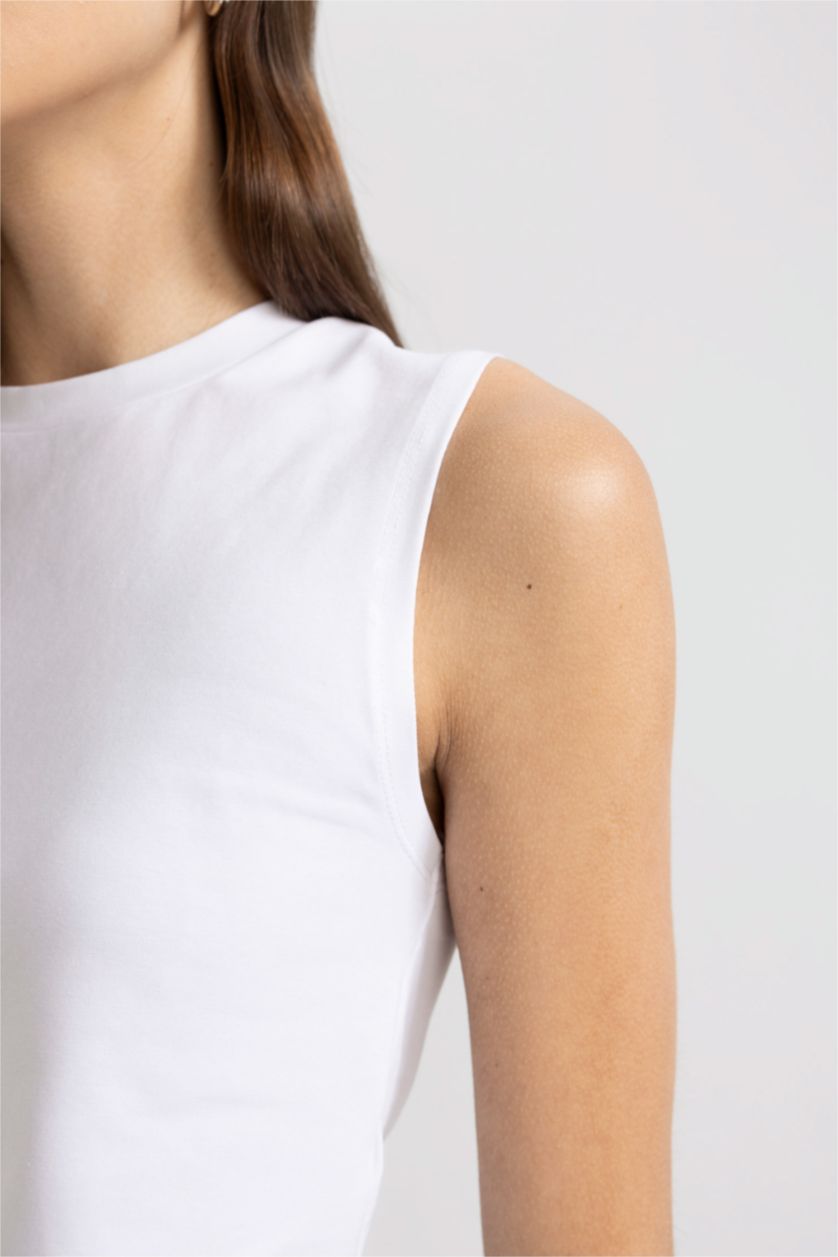 نساء أبيض كروب توب سادة بدون ردن بياخة مستديرة